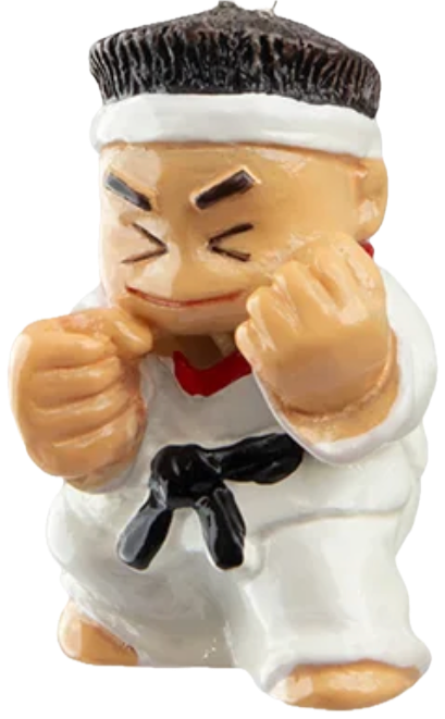 Mojo the Kooshie — a small karate figurine